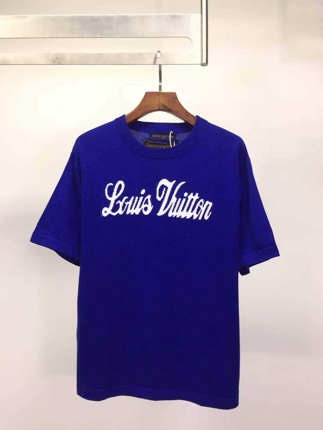 LV blue knit short-sleeve T-shirt with a white embroidered logo