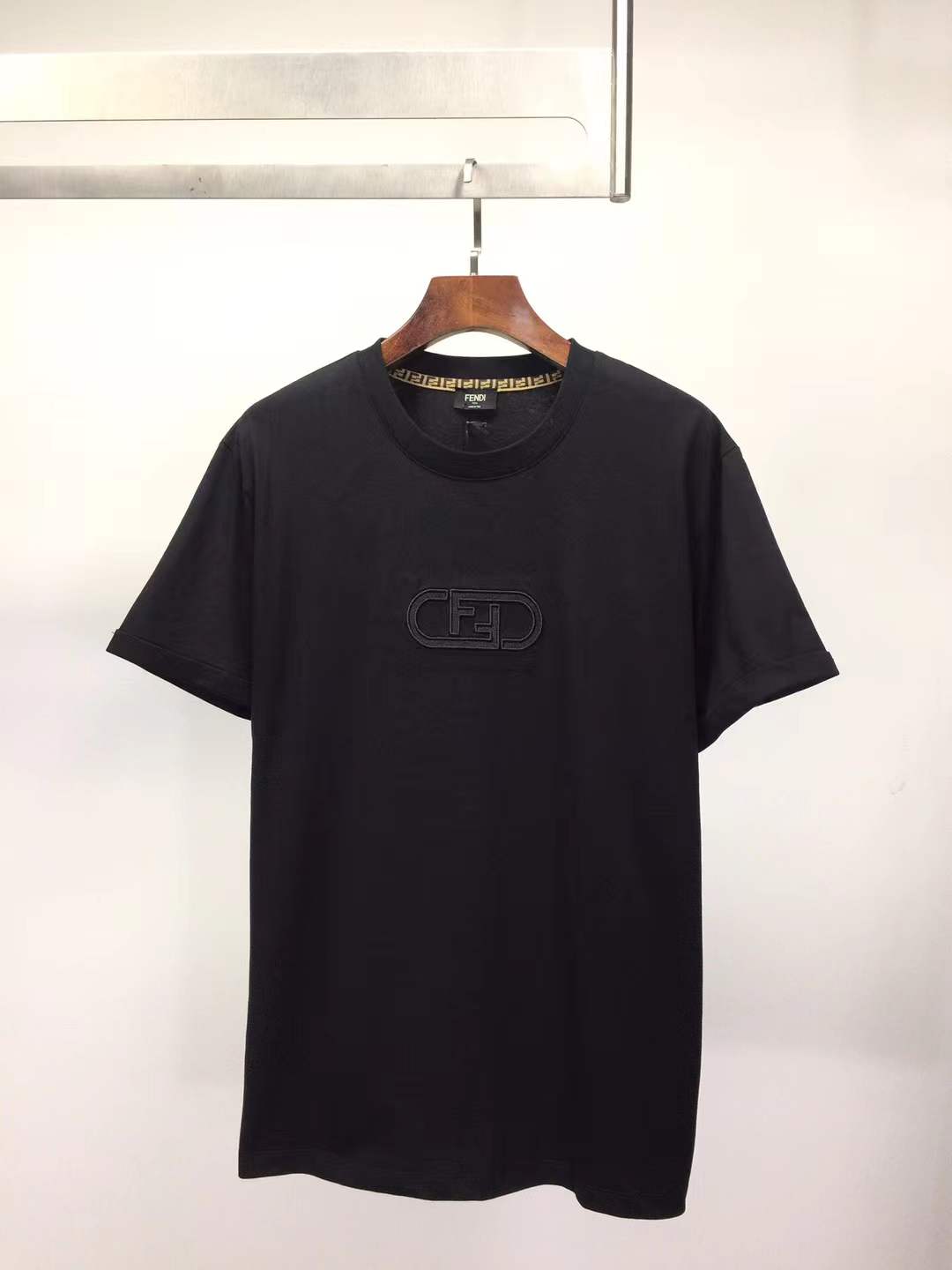 Fendi black cotton T-shirt with an embossed FF logo.
