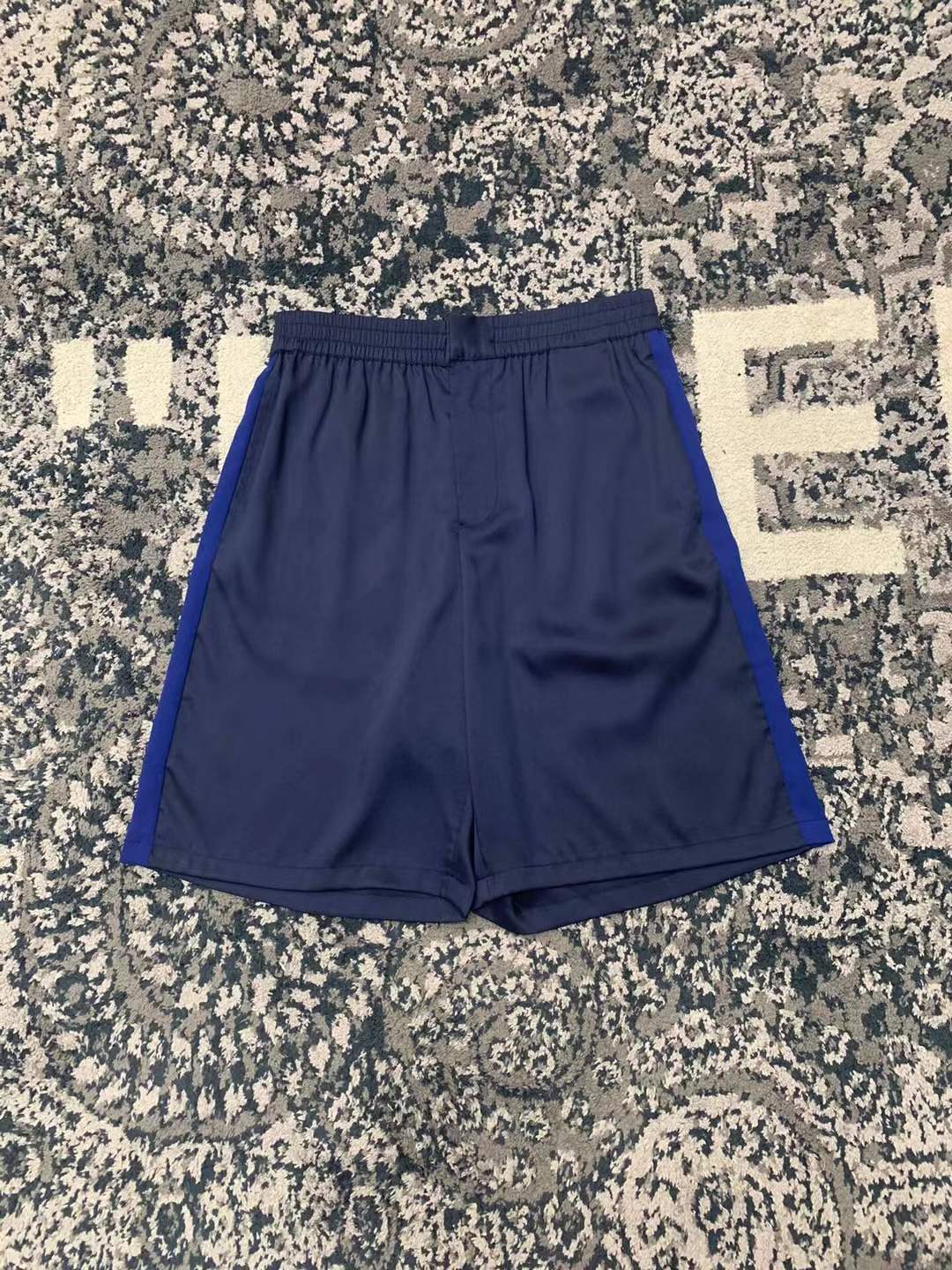prada navy blue athletic or basketball shorts with blue side panels