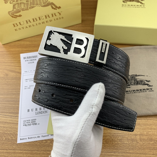 Burberry black leather belt with a silver-tone "B" logo buckle.