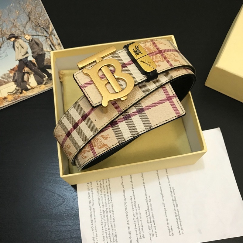 Burberry Reversible Check TB Belt in archive beige with a gold-plated Thomas Burberry Monogram plaque buckle, which reverses to smooth black leather