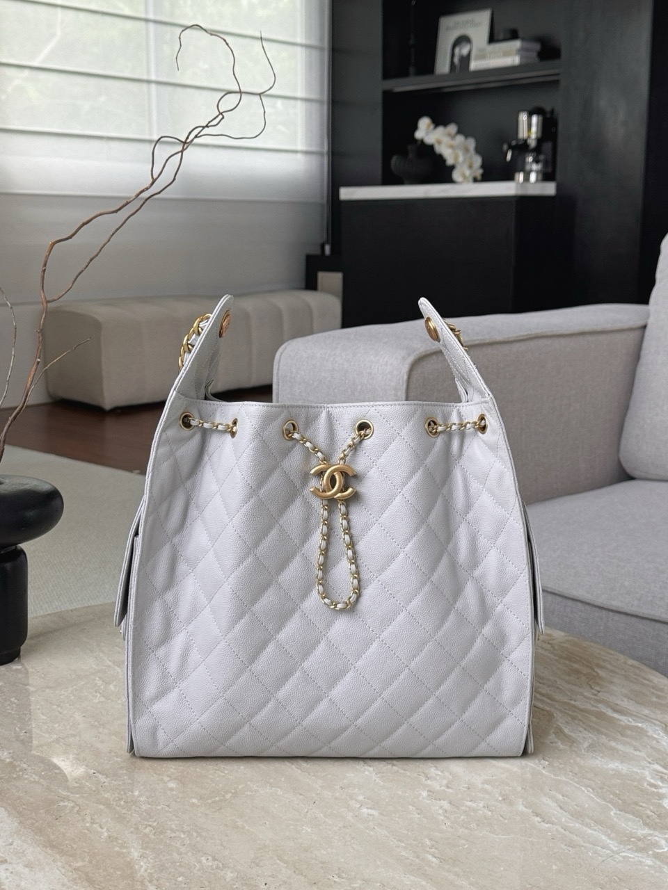 Chanel Code 10303 25S Small Hobo Bag in light blue caviar leather with gold-tone hardware Size 30x15x40cm