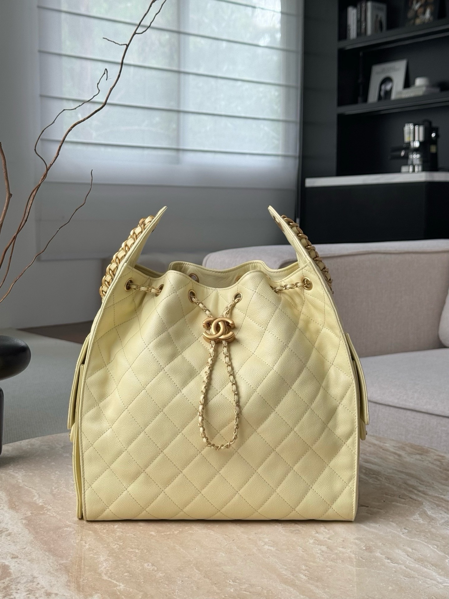 Chanel Code 10301 25S small hobo bag in light yellow (or beige) grained caviar leather with gold-tone metal hardware Size 30x15x40cm
