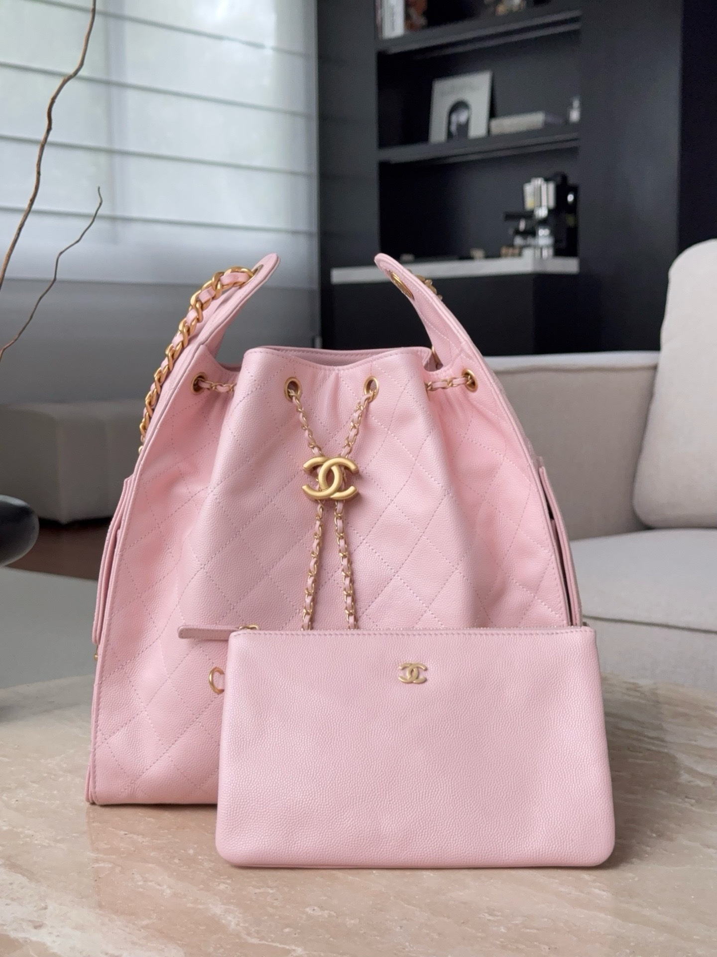 Chanel Code 10300 25S medium hobo bag in light pink grained calfskin leather with gold-tone metal hardware Size 30x15x40cm