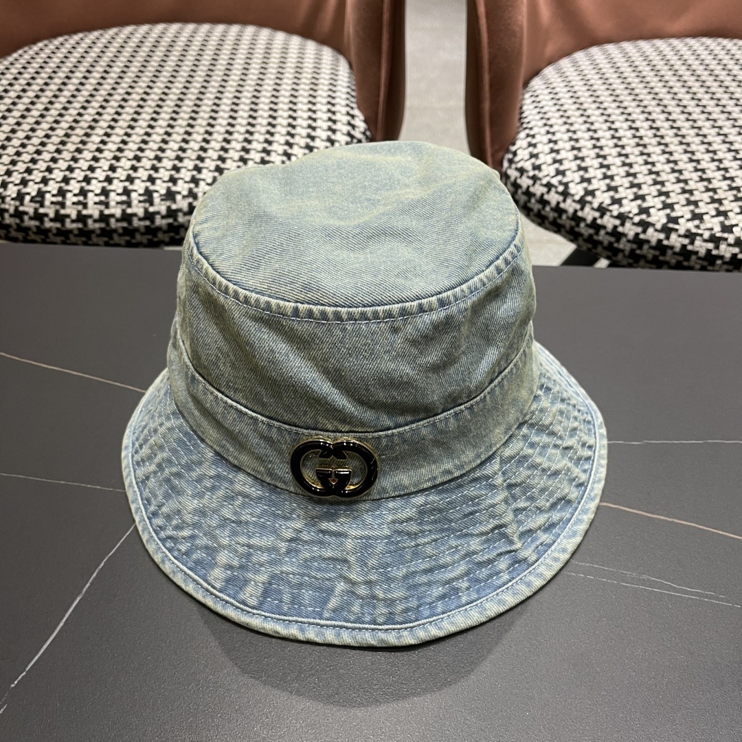 Gucci denim bucket hat in blue with the Interlocking G logo