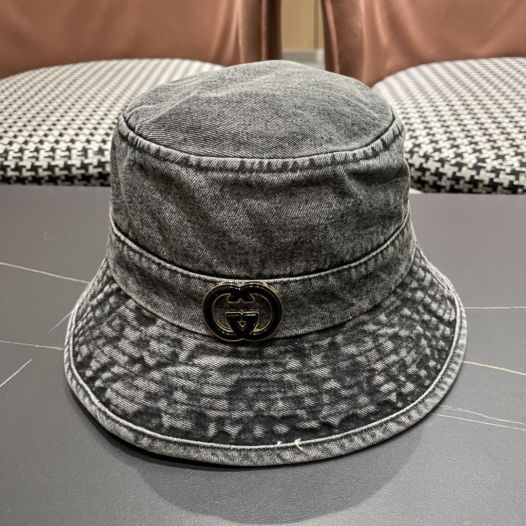 Gucci denim bucket hat in black with a GG monogram washed jacquard pattern