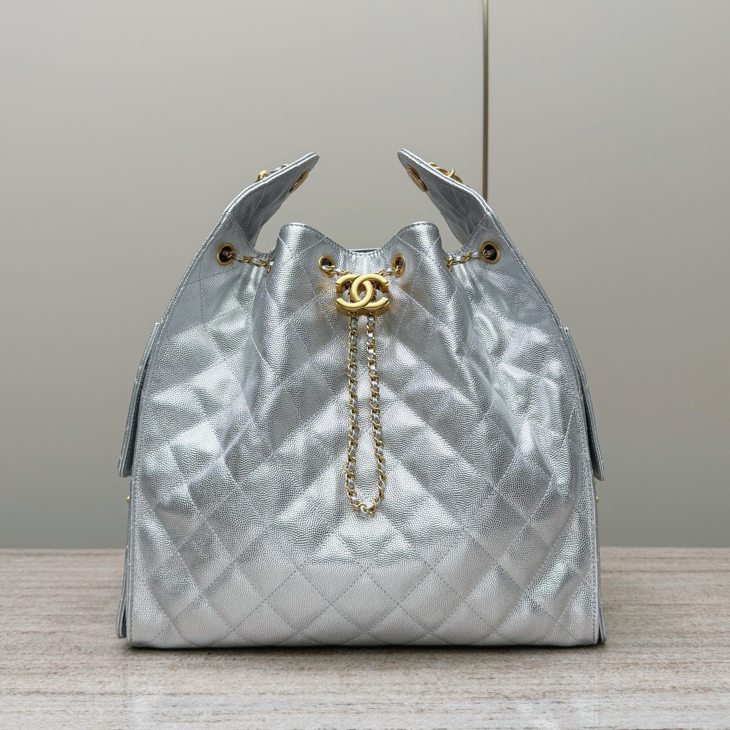 Chanel Code 10297 25S Hobo handbag in silver metallic caviar calfskin leather with gold-tone metal hardware Size 30x15x40cm