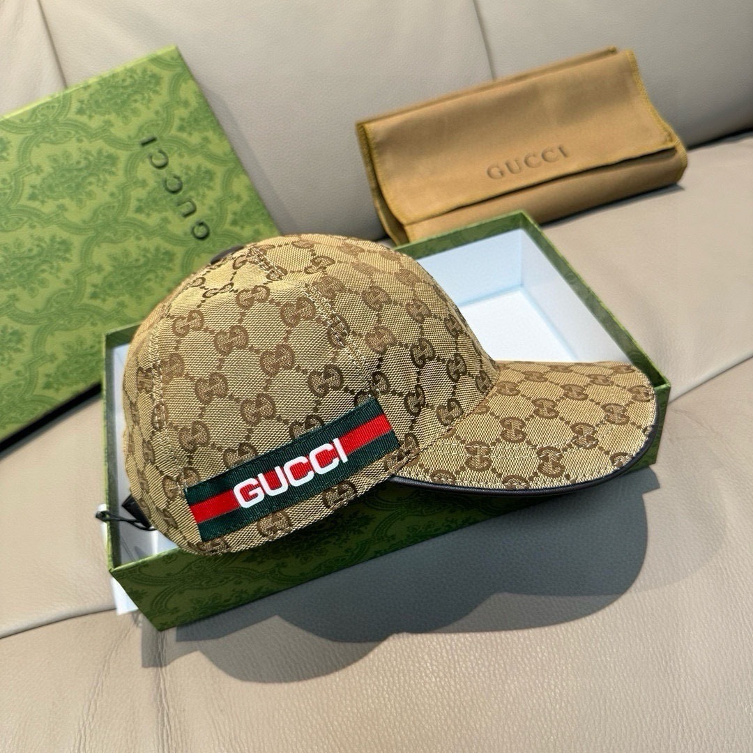 Gucci  Original GG canvas baseball hat with Web detail.