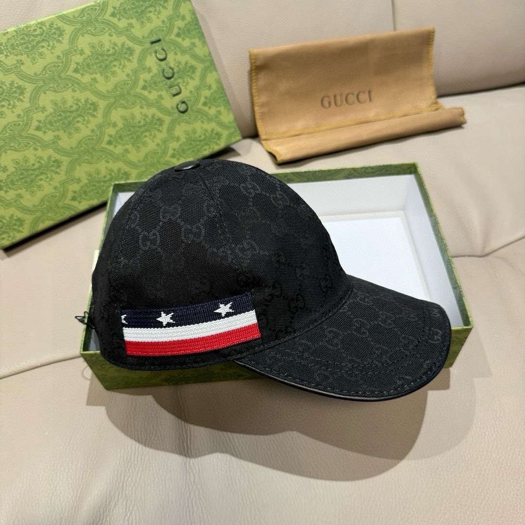 Gucci Original GG Canvas baseball hat in black with a web detail patch.