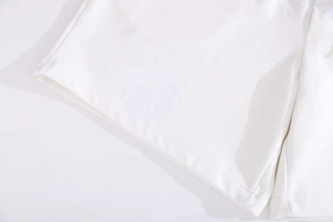 LV Denim Tears Mono Cotton Wreath Shorts in white cotton.