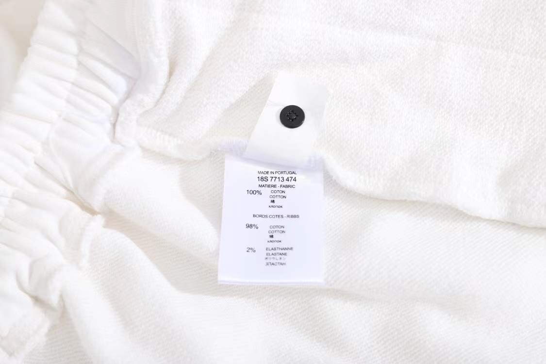 LV Denim Tears Mono Cotton Wreath Shorts in white cotton.