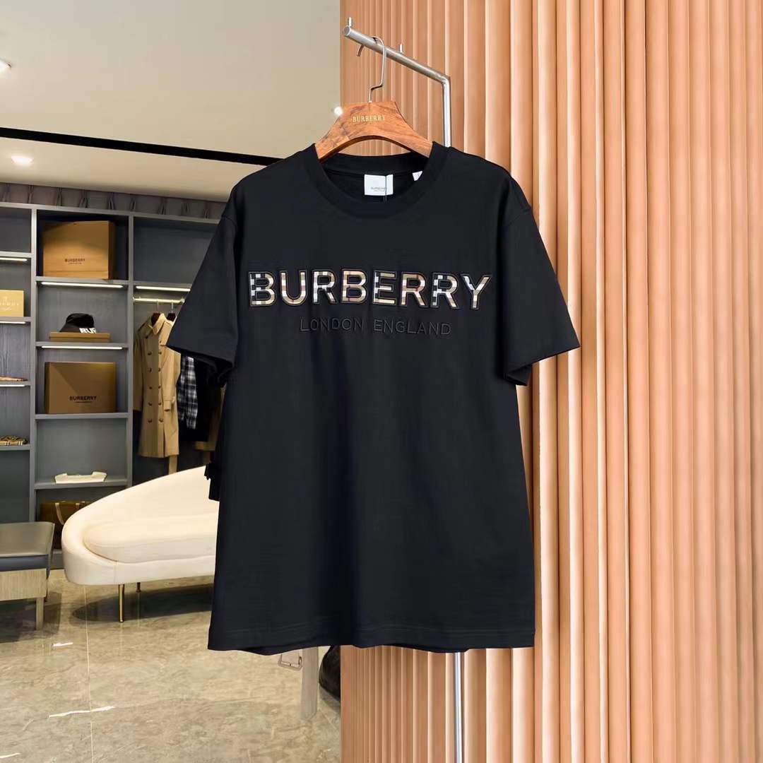Burberry black cotton logo T-shirt featuring the brand's logo lettering with a check detail on the front.