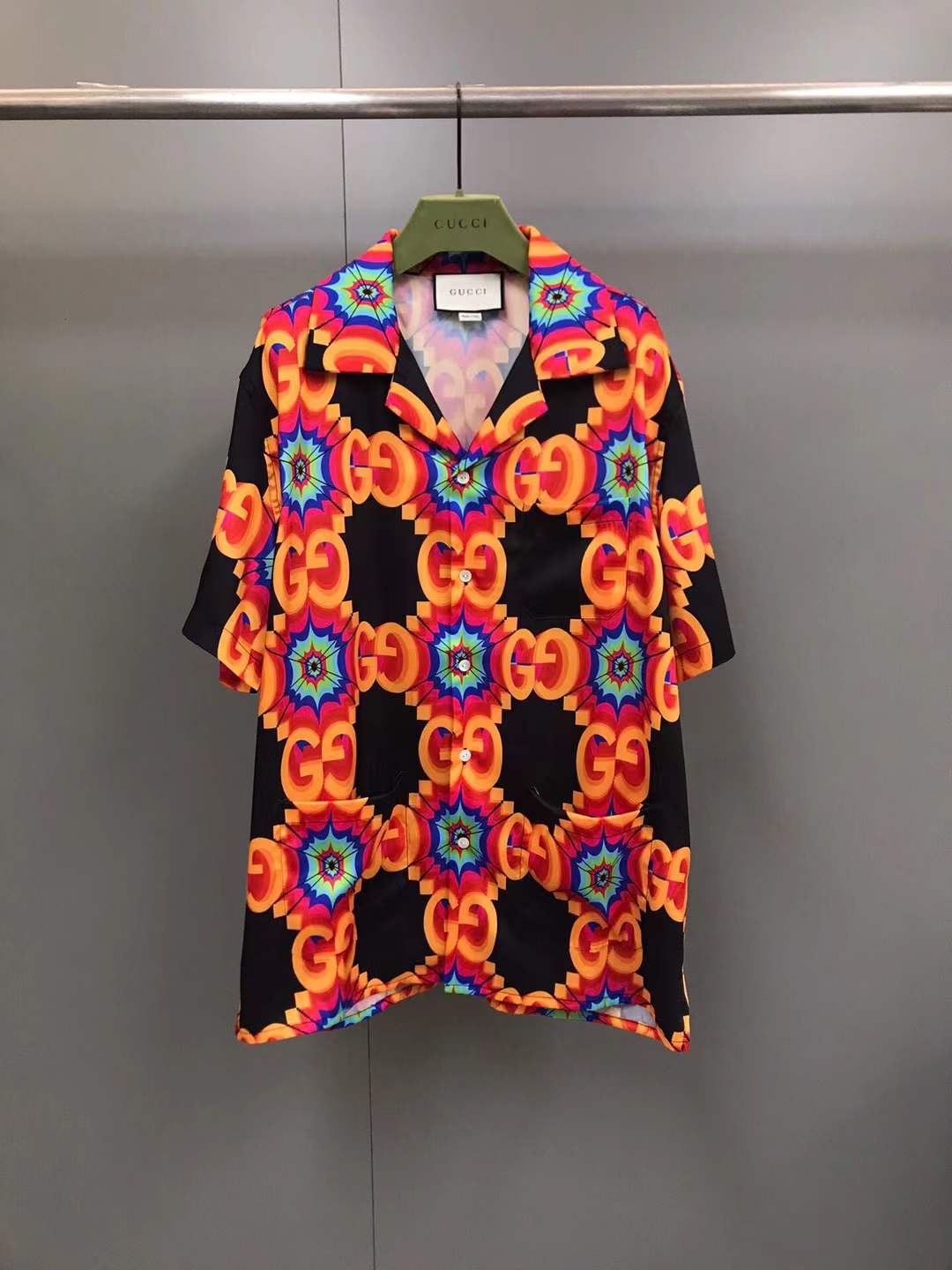 Gucci Aria GG Kaleidoscope silk bowling shirt in black, orange, and multicolor.