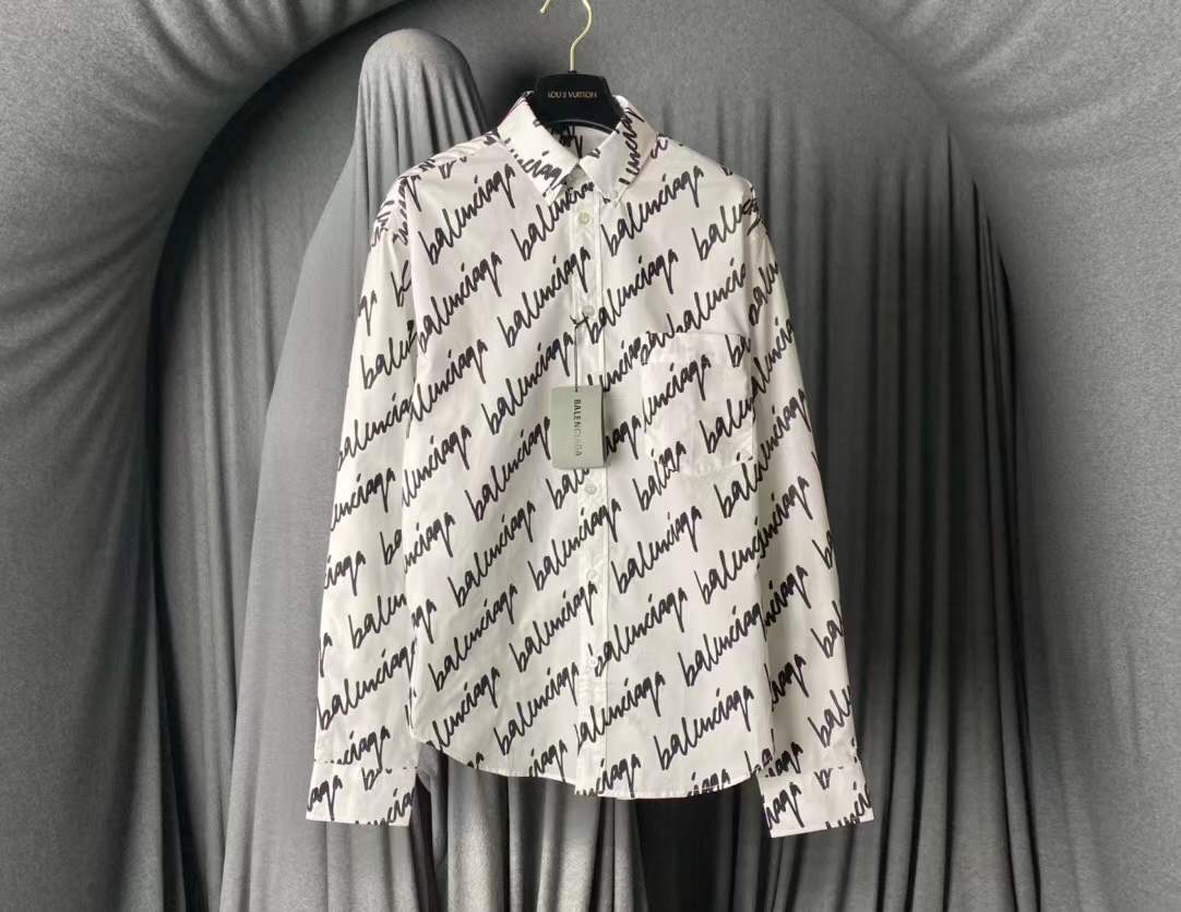Balenciaga shirt white with a black all-over logo print.