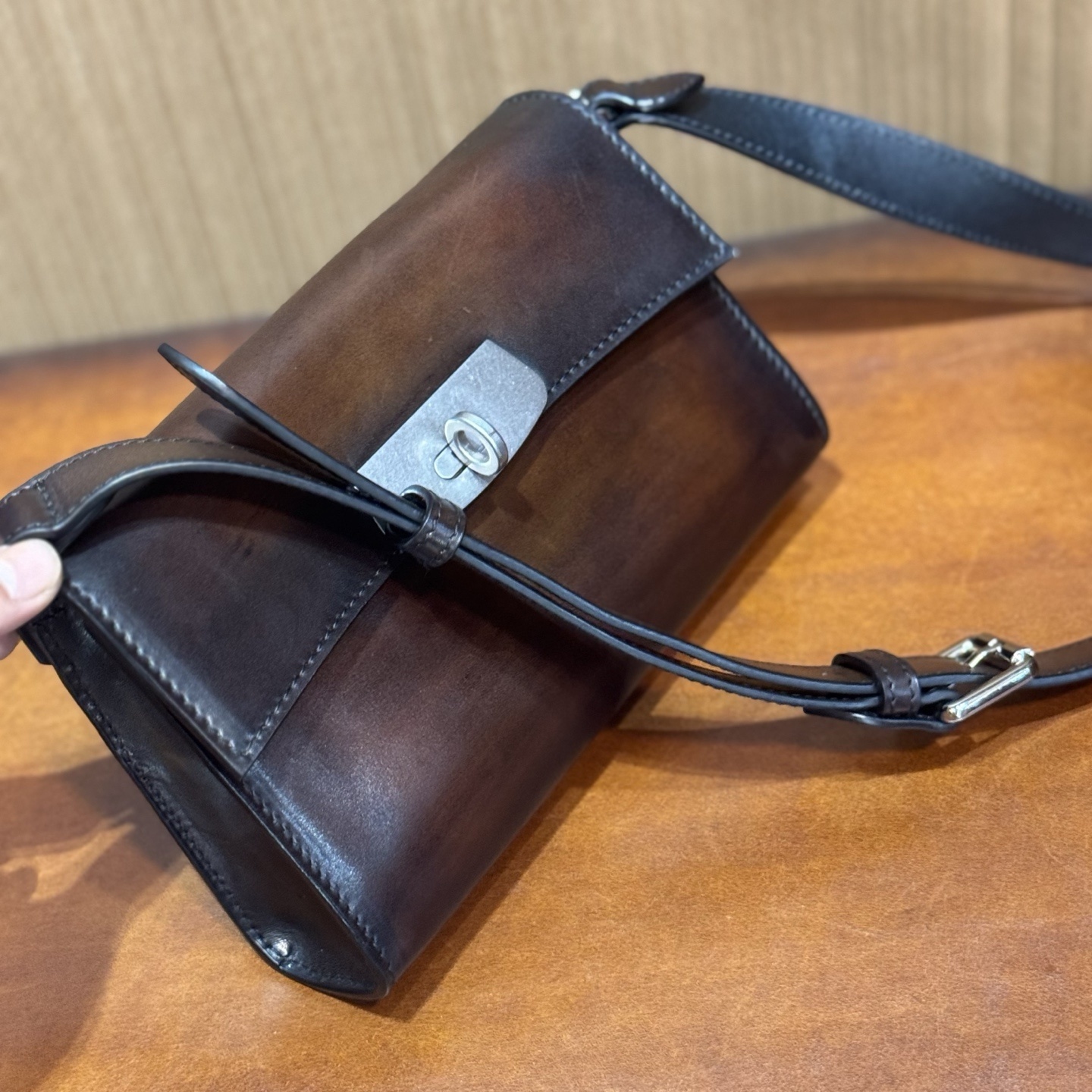 Berluti E'Mio Scritto Venezia leather messenger bag in dark brown