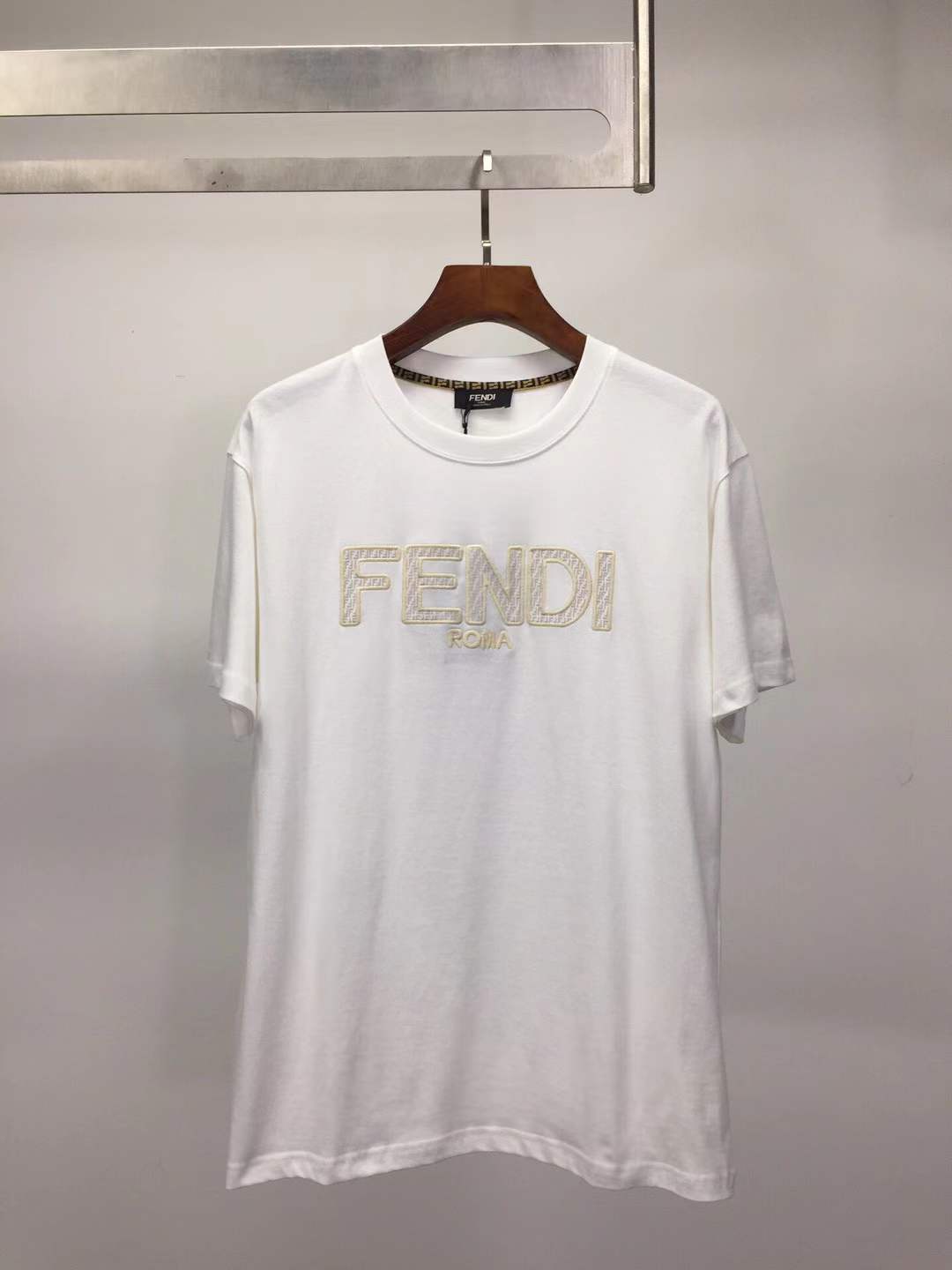 Fendi cotton crew neck T-shirt white with a 3D-effect embroidered or flocked "Fendi Roma" logo on the front.