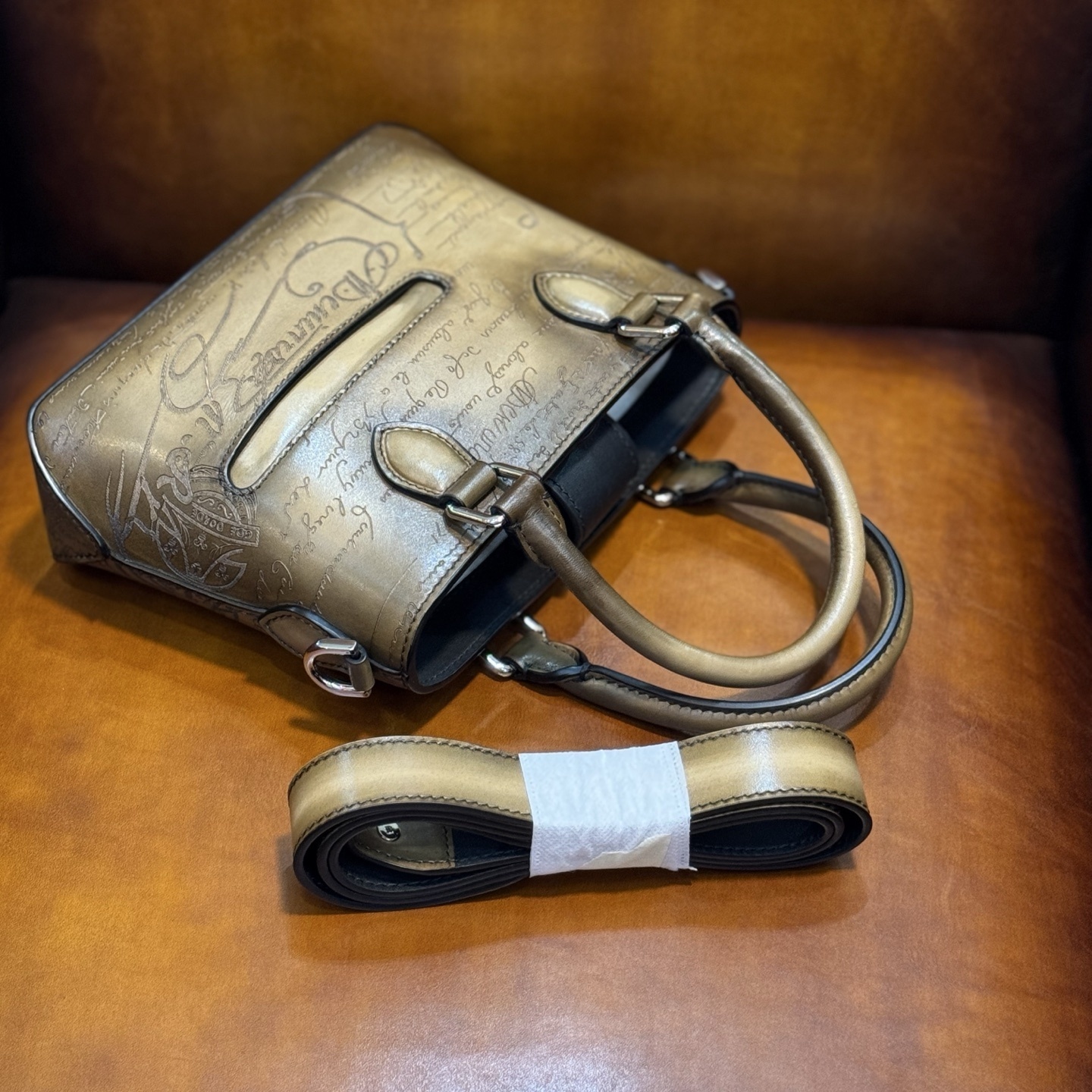 Berluti Toujours Gulliver handbag in Venezia leather with a Scritto (calligraphy) design