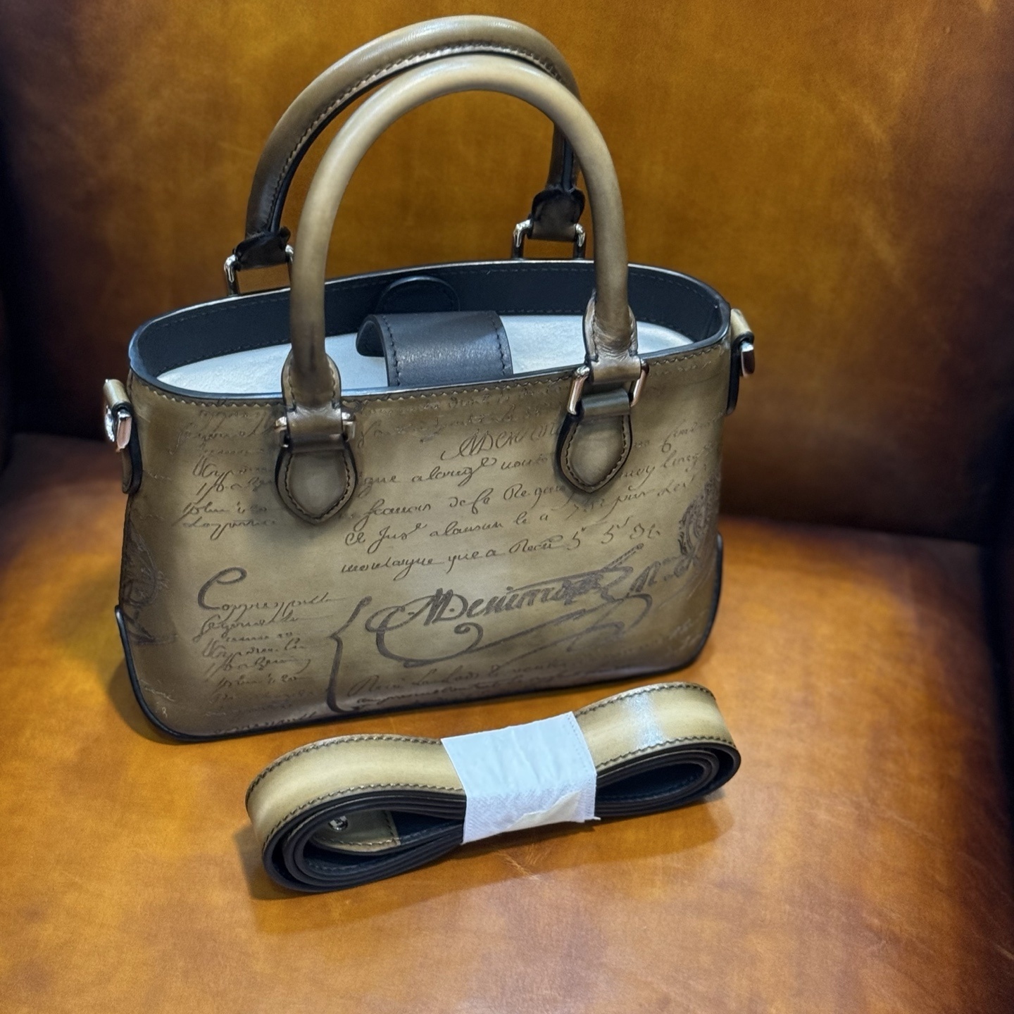 Berluti Toujours Gulliver handbag in Venezia leather with a Scritto (calligraphy) design