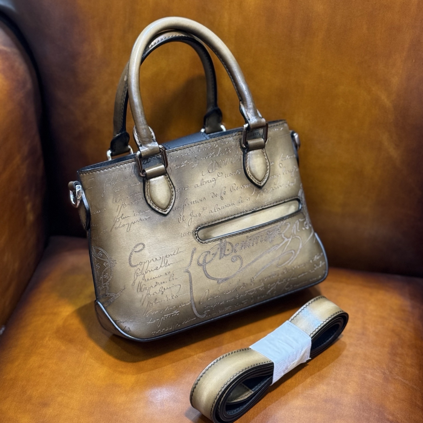 Berluti Toujours Gulliver handbag in Venezia leather with a Scritto (calligraphy) design