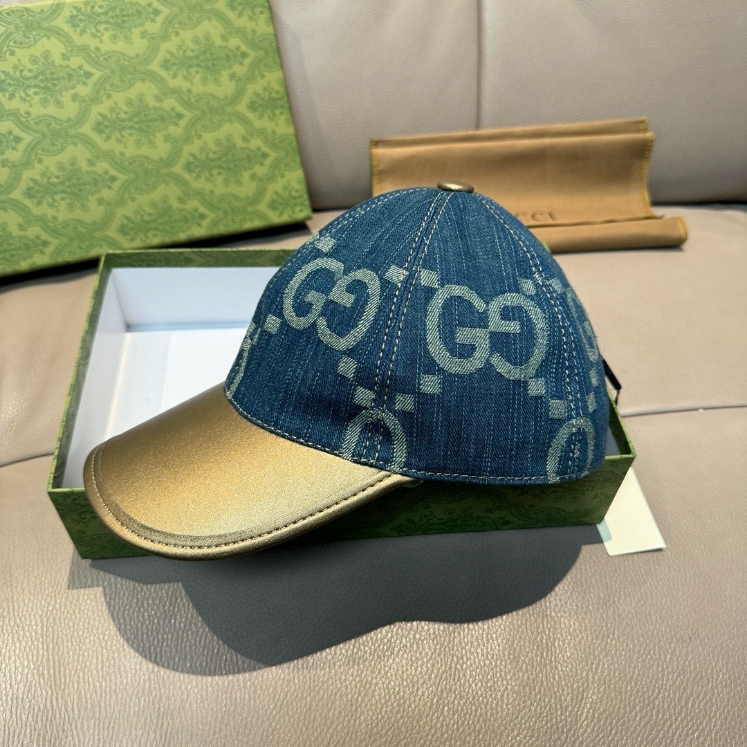 Gucci GG cotton canvas baseball cap in blue with a gold-tone bill.
