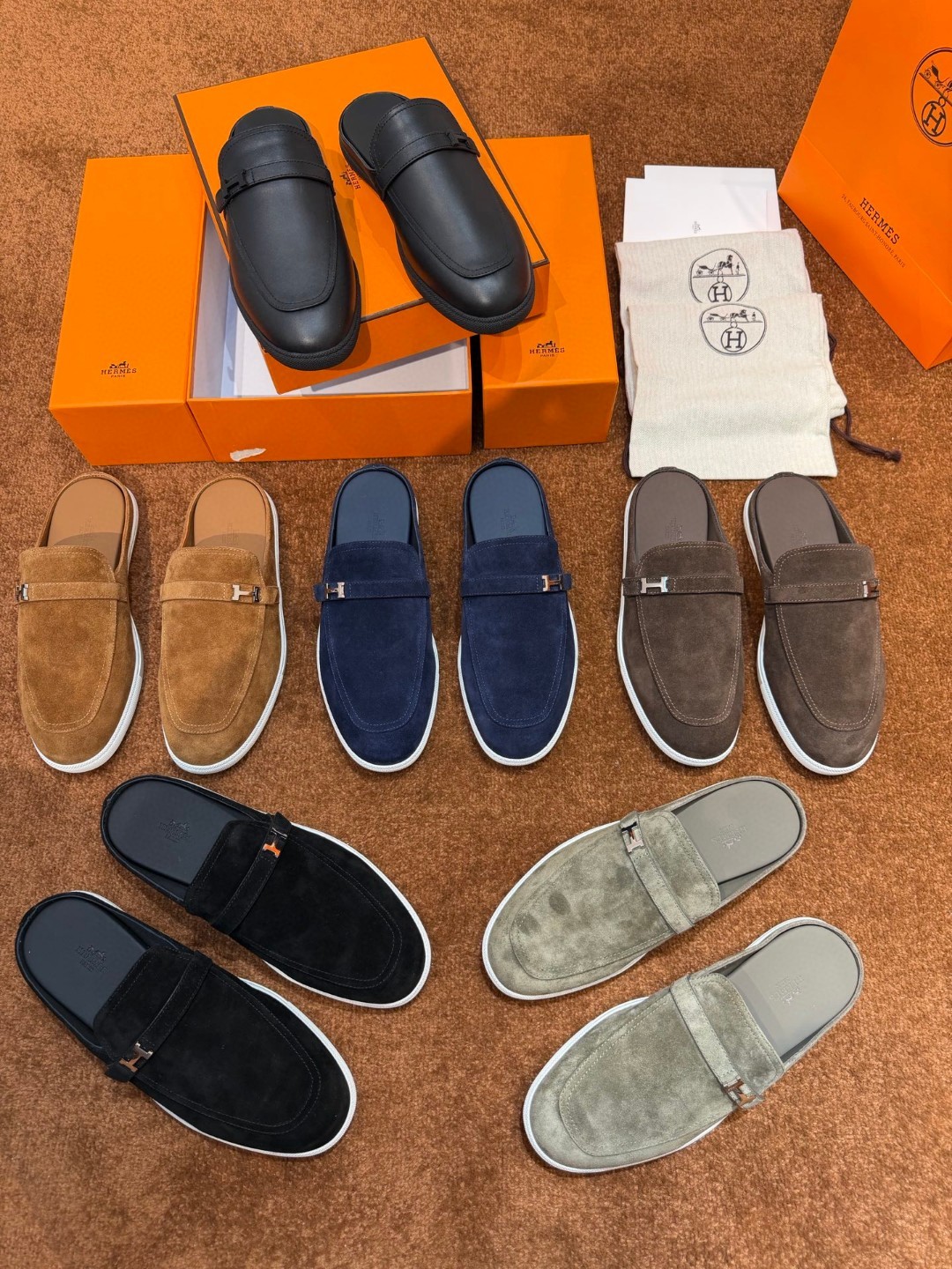 Hermès Likely mule in Écorce brown suede with a palladium-plated H buckle and rubber sole