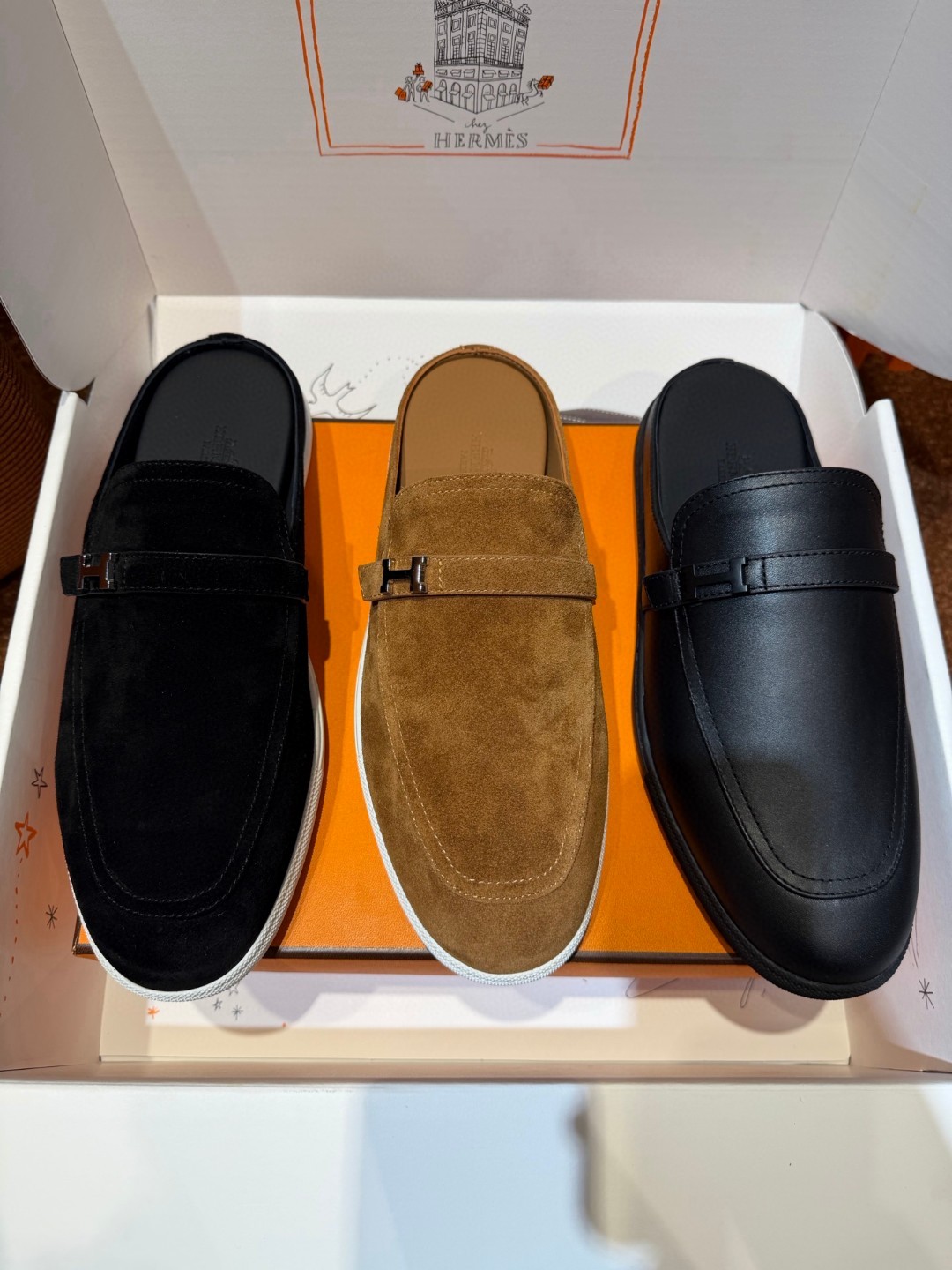 Hermès Likely mule in Écorce brown suede with a palladium-plated H buckle and rubber sole