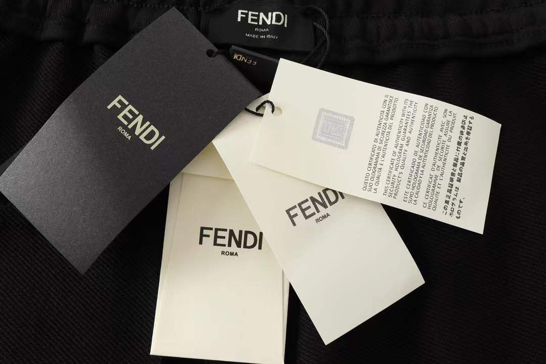 fendi Monster Eyes nylon swim shorts in black/grey.