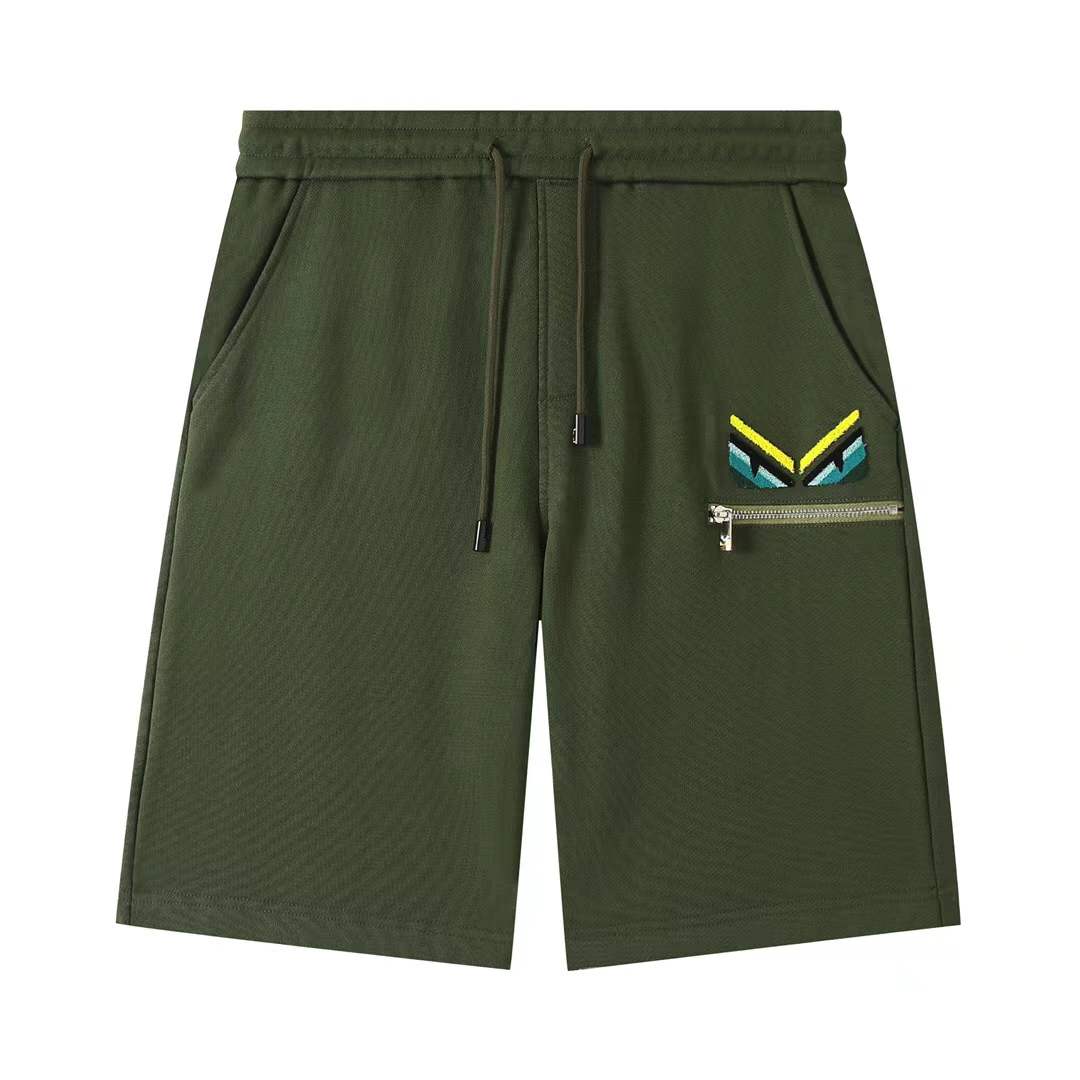 Fendi men's green shorts with a Monster Eyes motif.