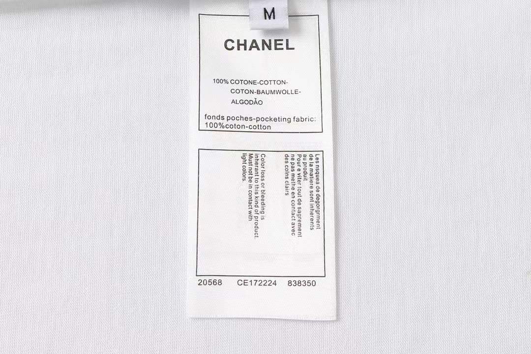 chanel t-shirt with a blue floral logo