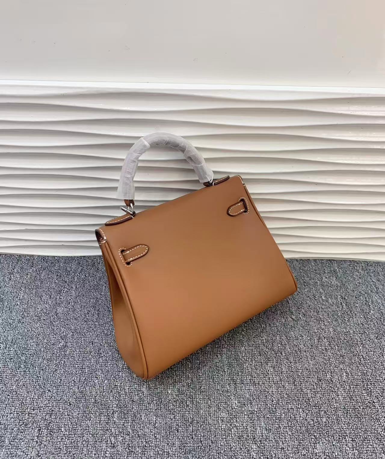 Hermès Kelly Sellier 25 handbag in gold Epsom leather with palladium hardware