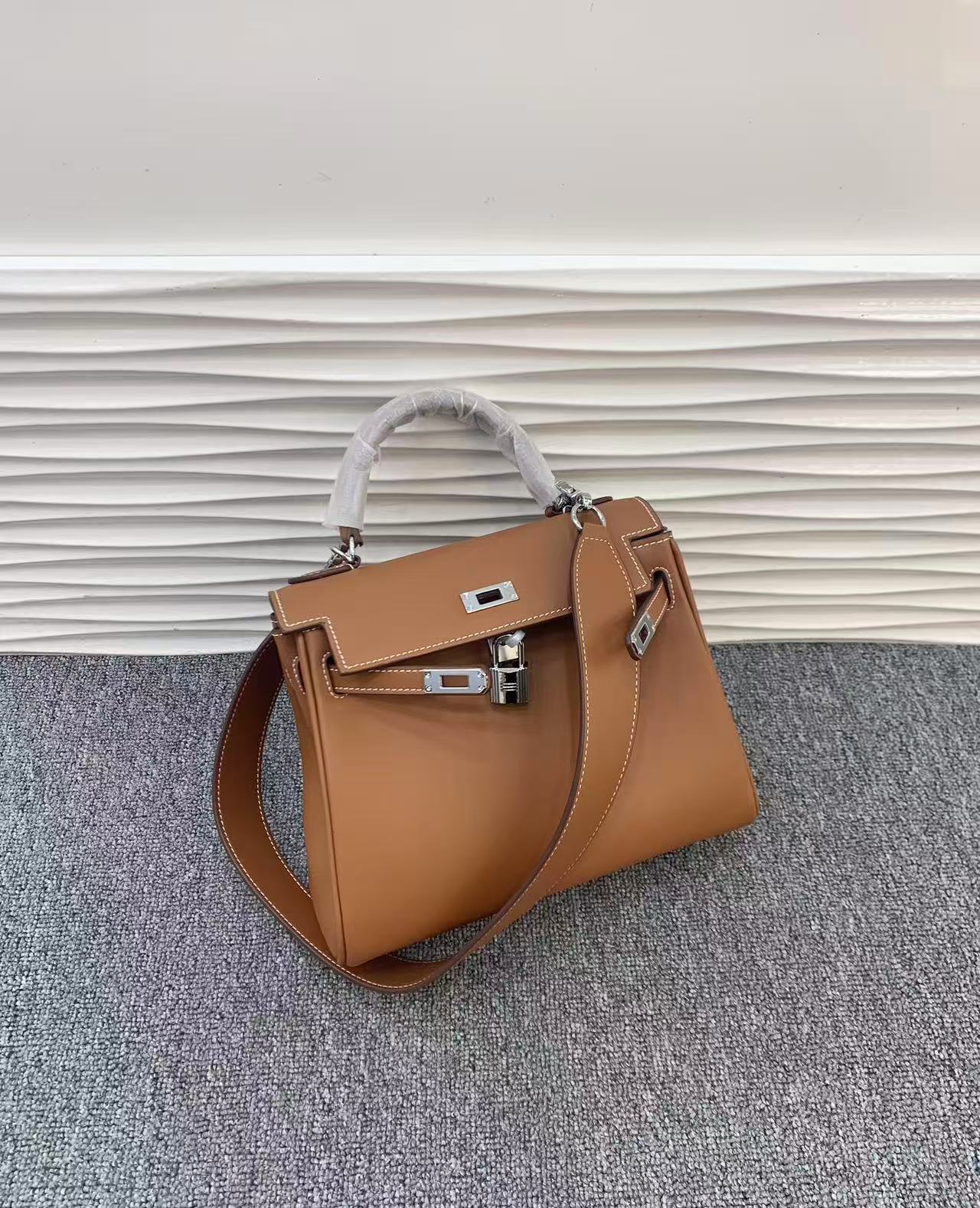 Hermès Kelly Sellier 25 handbag in gold Epsom leather with palladium hardware