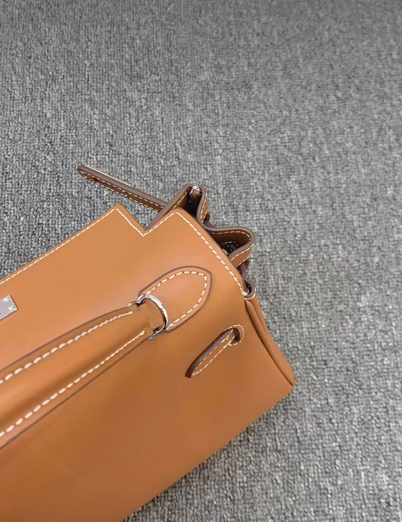 Hermès Kelly Sellier 25 handbag in gold Epsom leather with palladium hardware