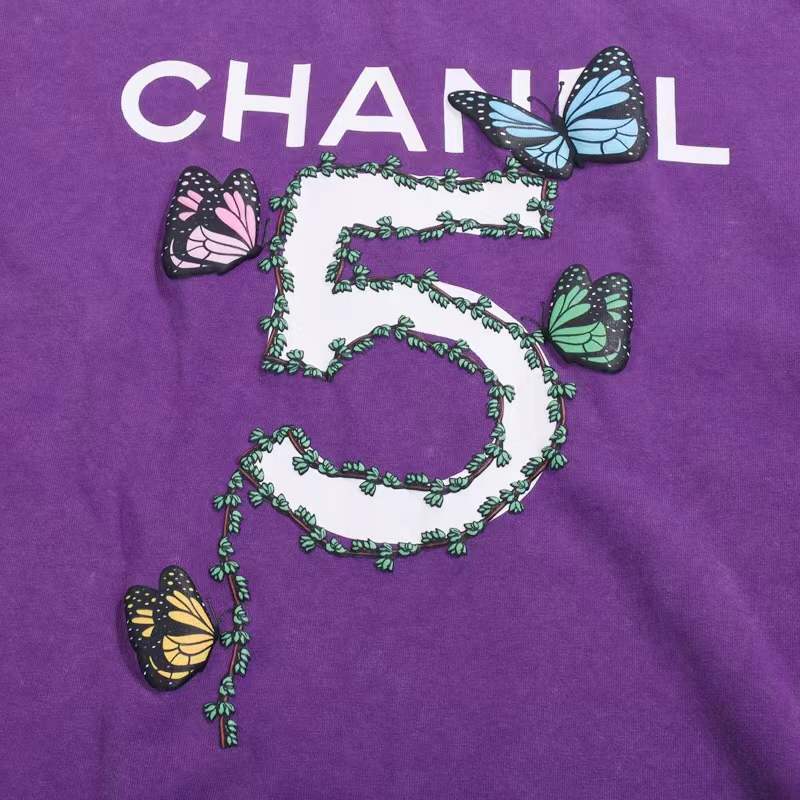 Chanel x Pharrell Coco Chanel Logo T-Shirt with a butterfly design