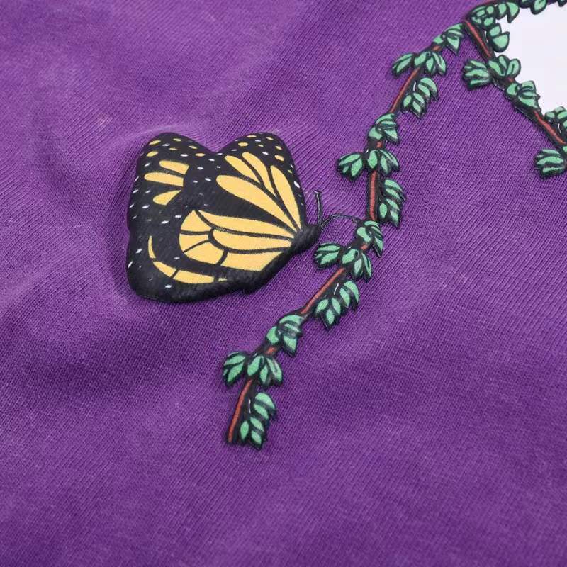 Chanel x Pharrell Coco Chanel Logo T-Shirt with a butterfly design