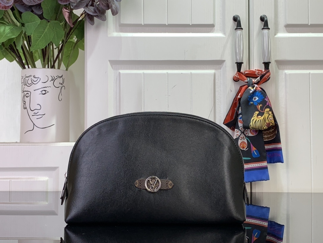 LV Cosmetic Pouch MM in black lambskin leather with silver-toned hardware and the LV Circle signature