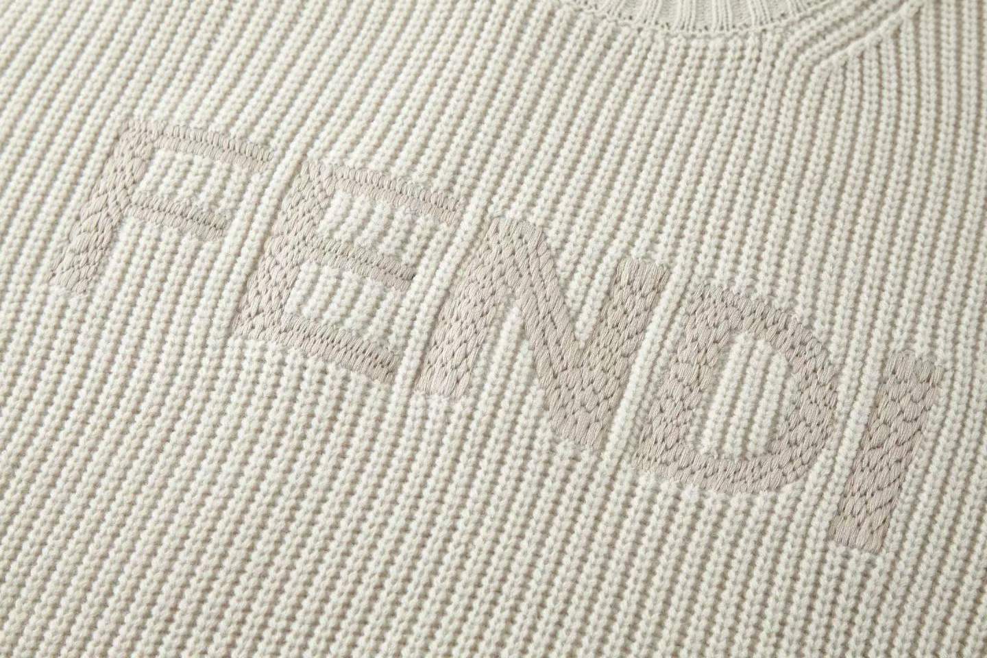Fendi cream wool pullover with a maxi Fendi logo embroidered on the front.