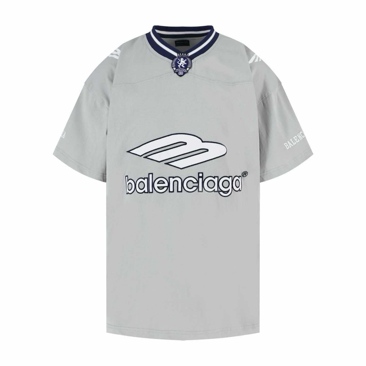 Balenciaga 3B Football V-Neck T-shirt Oversized in dark navy and red dry jersey.