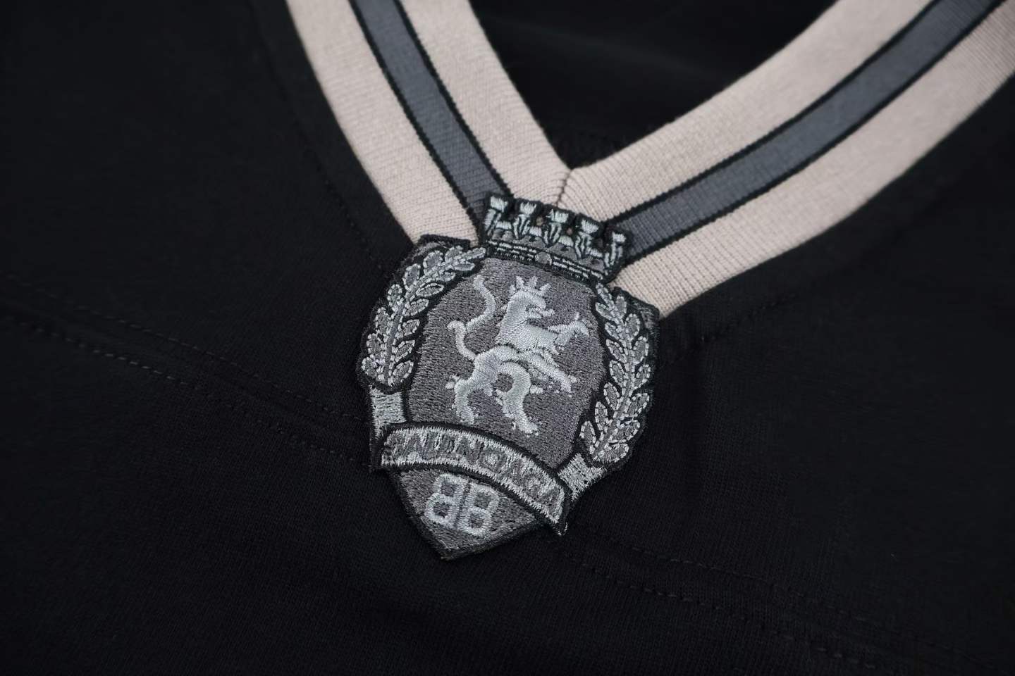 Balenciaga 3B Football V-Neck T-shirt Oversized in dark navy and red dry jersey.