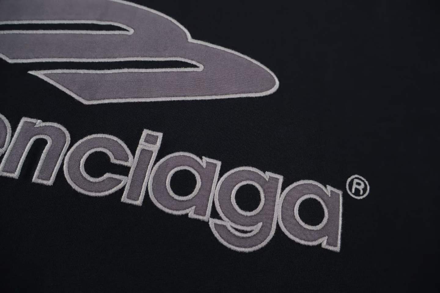 Balenciaga 3B Football V-Neck T-shirt Oversized in dark navy and red dry jersey.