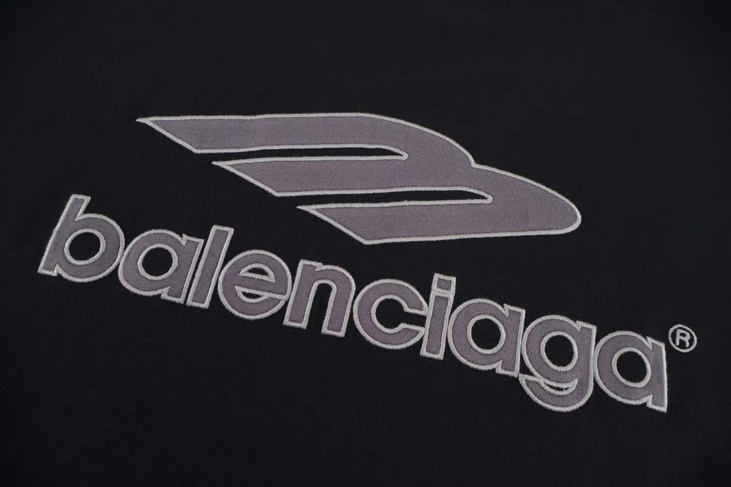 Balenciaga 3B Football V-Neck T-shirt Oversized in dark navy and red dry jersey.