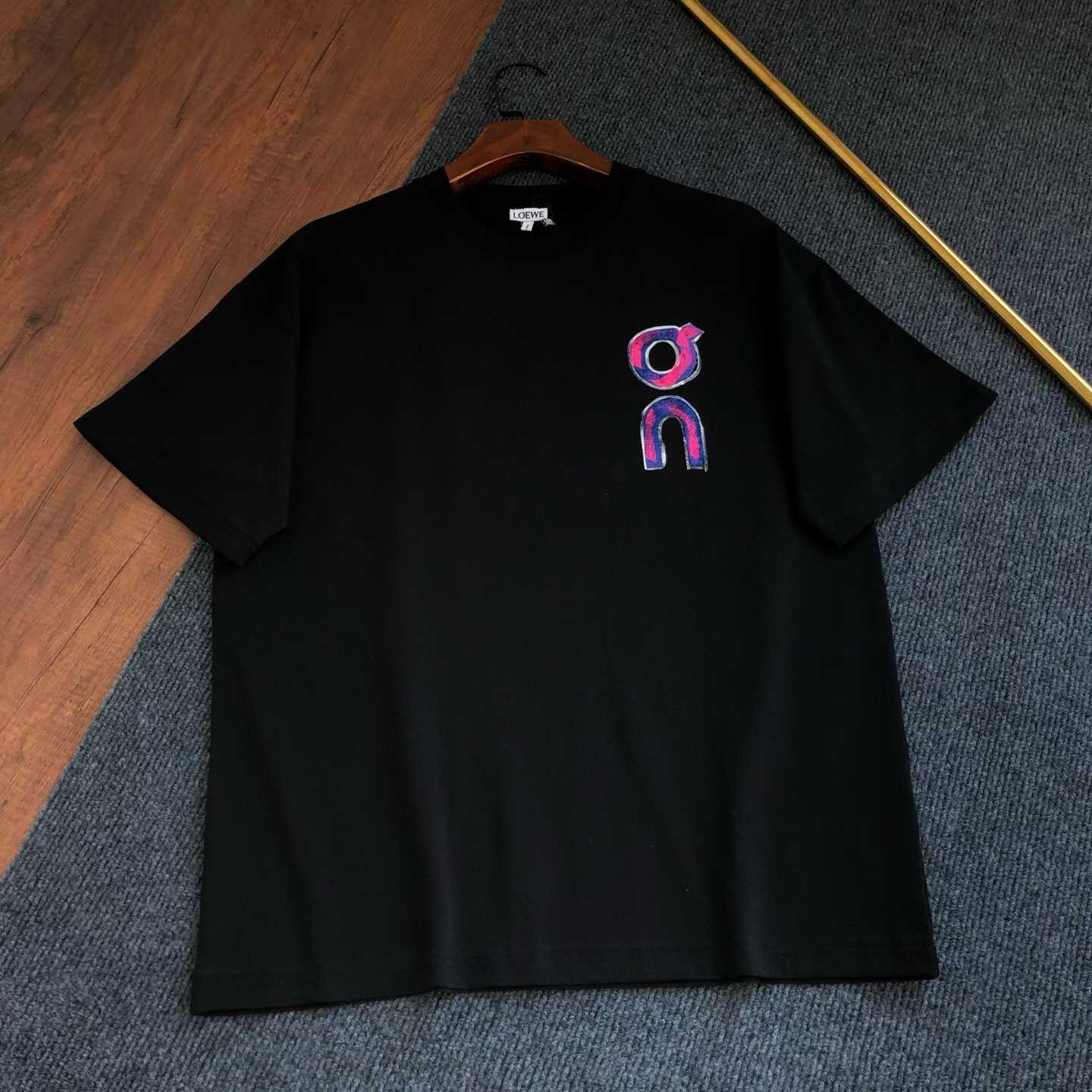 loewe black oversized crew neck t-shirt with a colorful graphic print