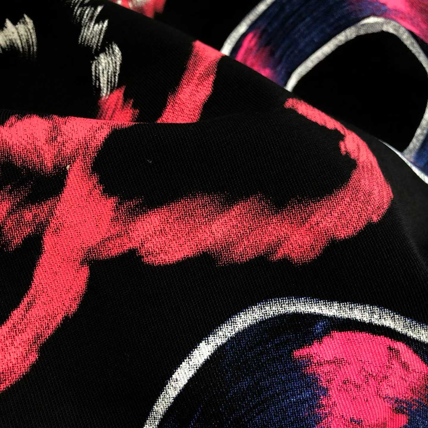 loewe black oversized crew neck t-shirt with a colorful graphic print