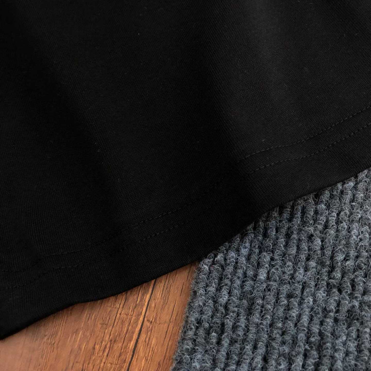 loewe black oversized crew neck t-shirt with a colorful graphic print