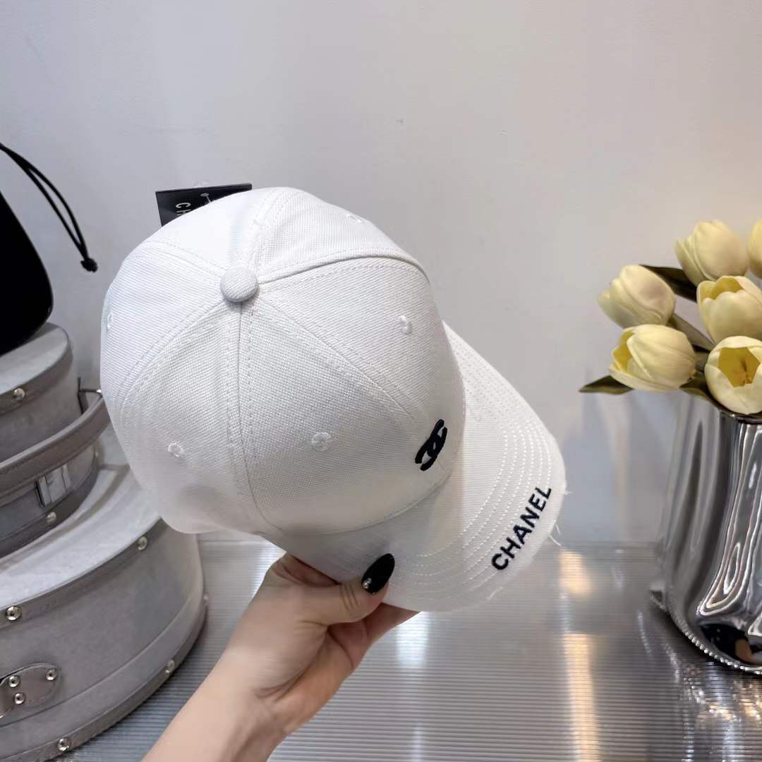 Chanel cotton baseball cap with an embroidered black CC logo