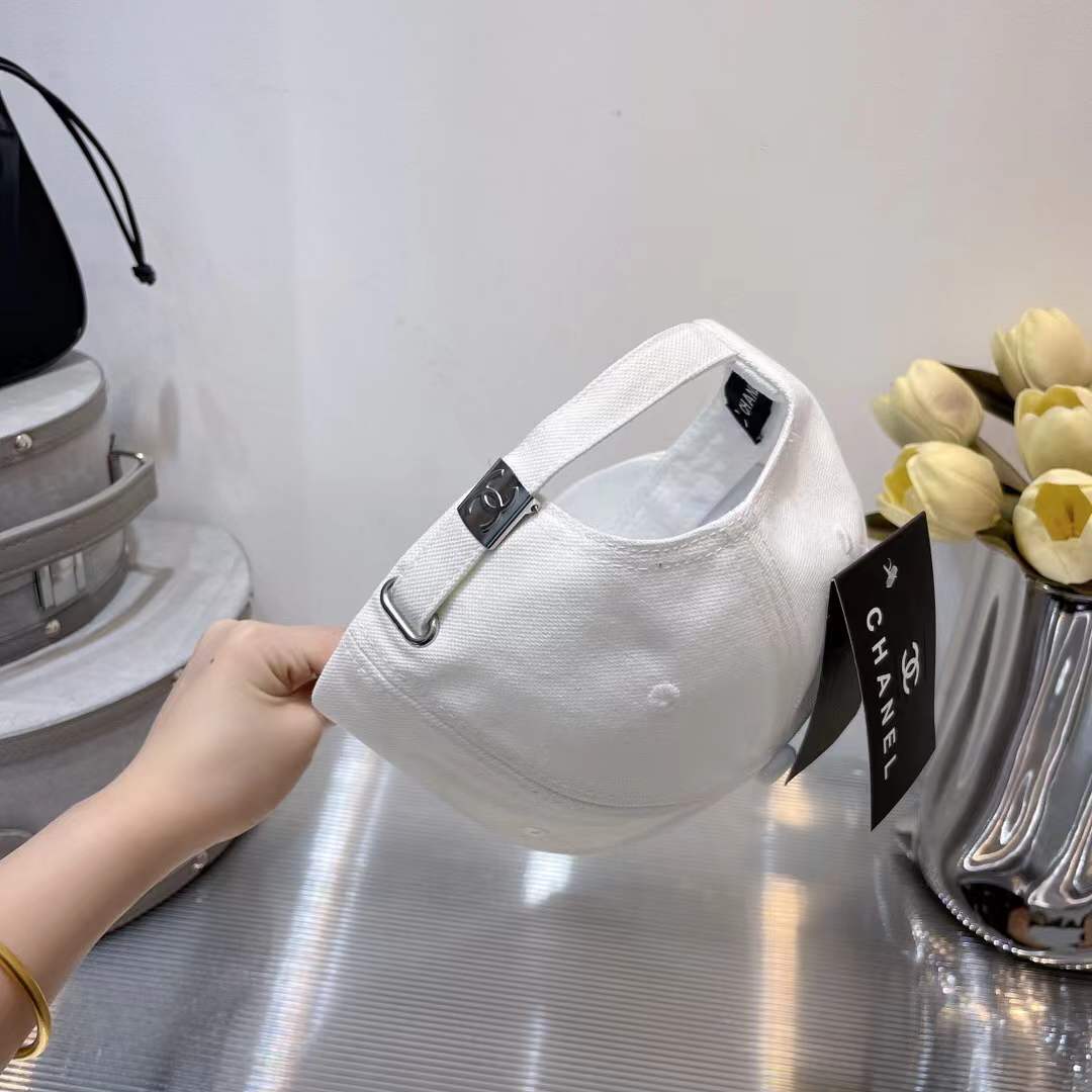 Chanel cotton baseball cap with an embroidered black CC logo