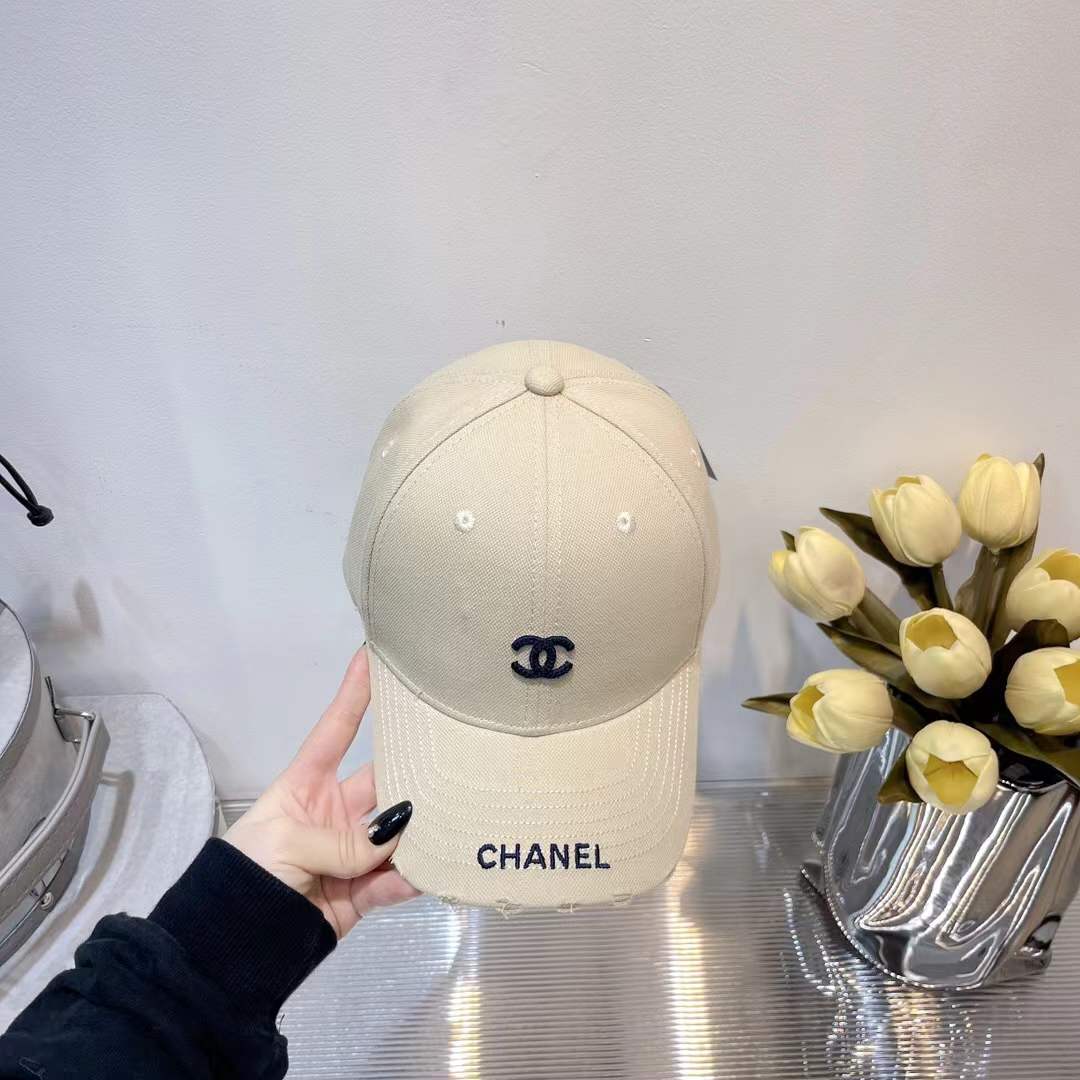 Chanel baseball cap embroidered black CC logo on the front and "CHANEL" text on the brim