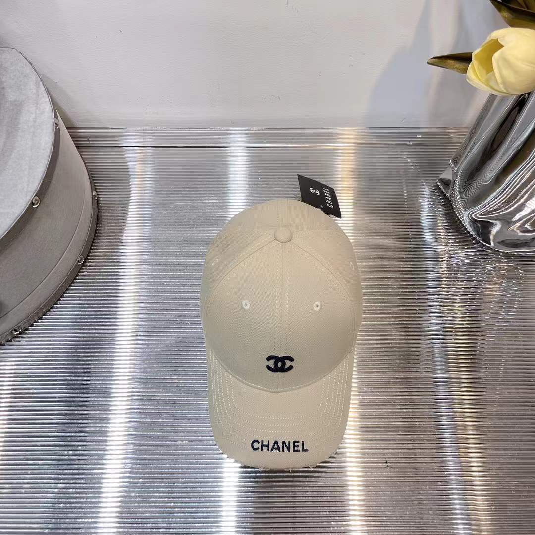 Chanel baseball cap embroidered black CC logo on the front and "CHANEL" text on the brim