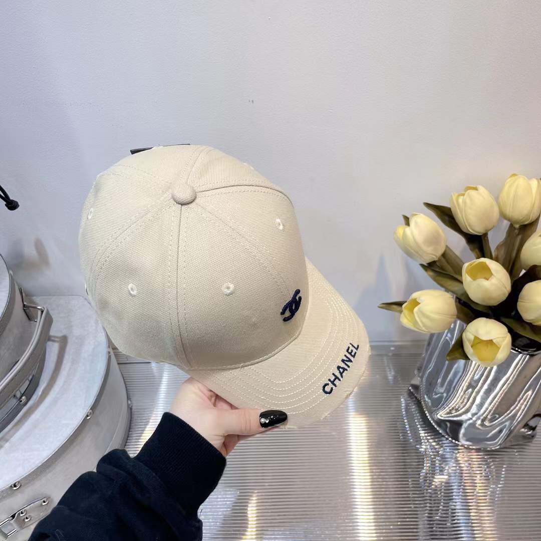 Chanel baseball cap embroidered black CC logo on the front and "CHANEL" text on the brim