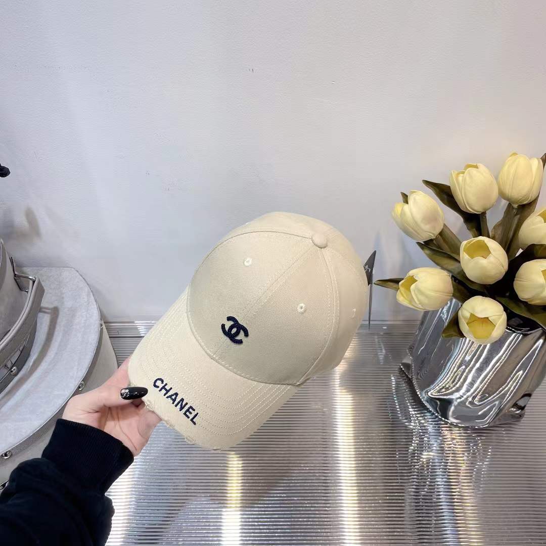 Chanel baseball cap embroidered black CC logo on the front and "CHANEL" text on the brim