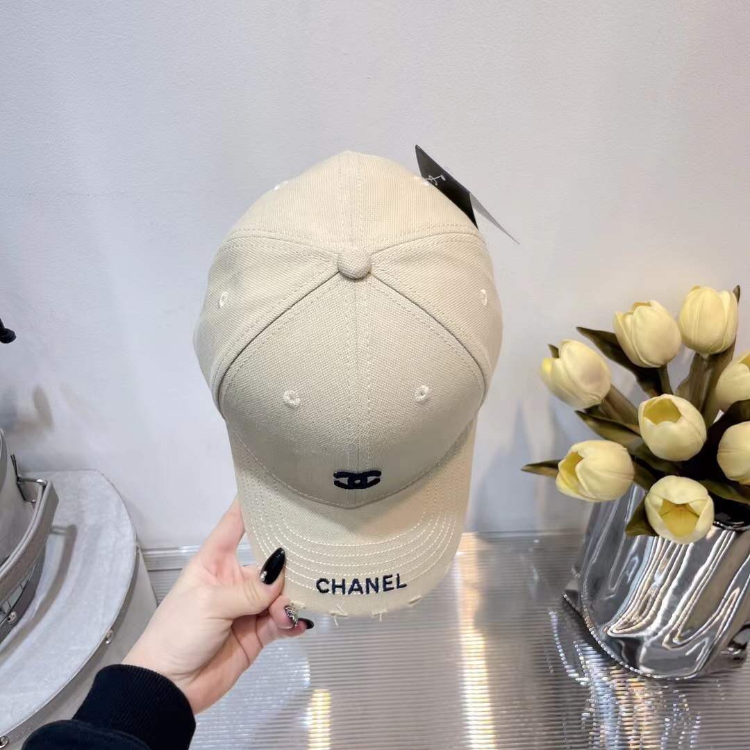 Chanel baseball cap embroidered black CC logo on the front and "CHANEL" text on the brim